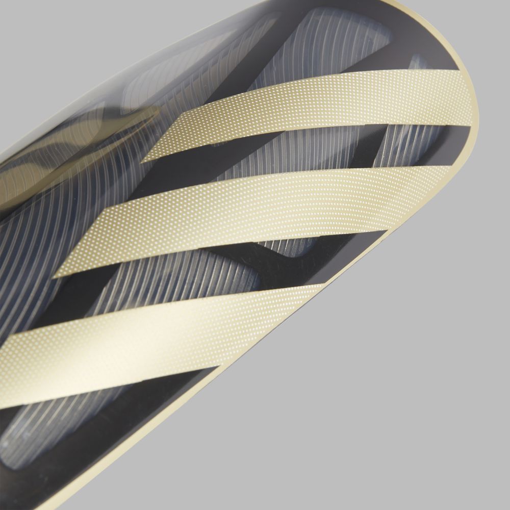 Canilleras adidas Tiro League-Negro-Dorado